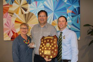 The Kellett Family Senior Club person of the year award winner Matt Lehmann (centre) with Kellett family member Deb Stoll and Club President Steven Gallasch