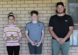 Under 13 Gold (left to right): Eliza Betts (Coaches Award), Jesse Demaine (Most Improved) & Byron Hoffmann (Coach). Rising Star - Georgia Schmidt (absent).